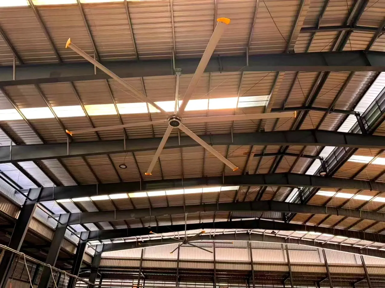 Ayzair HVLS fan running in an industrial shed